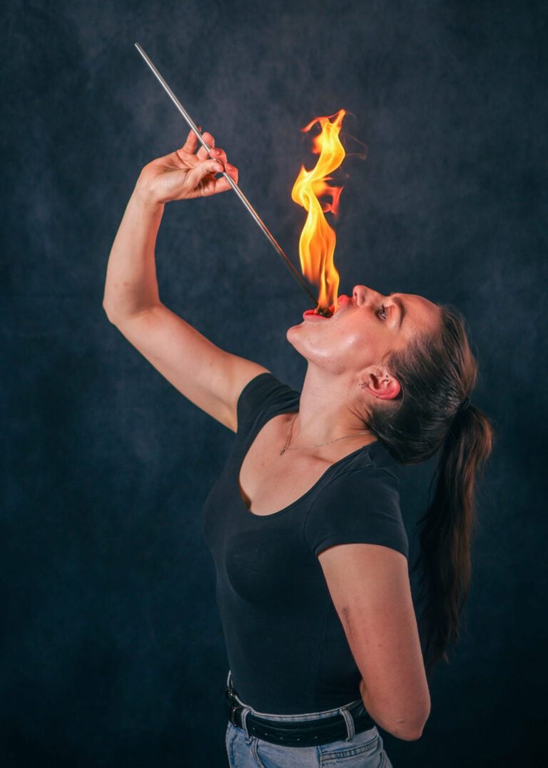 Student learning fire body trails at a Fire In Your Face workshop