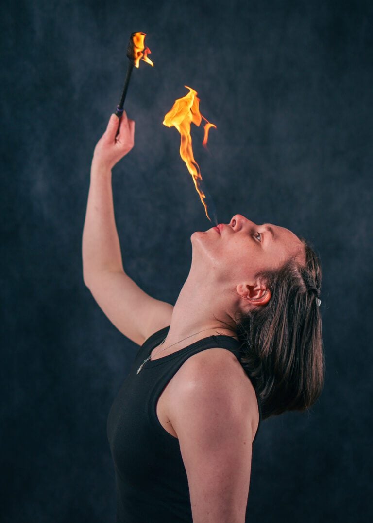 Fire manipulation instructor demonstrating vapour collection technique